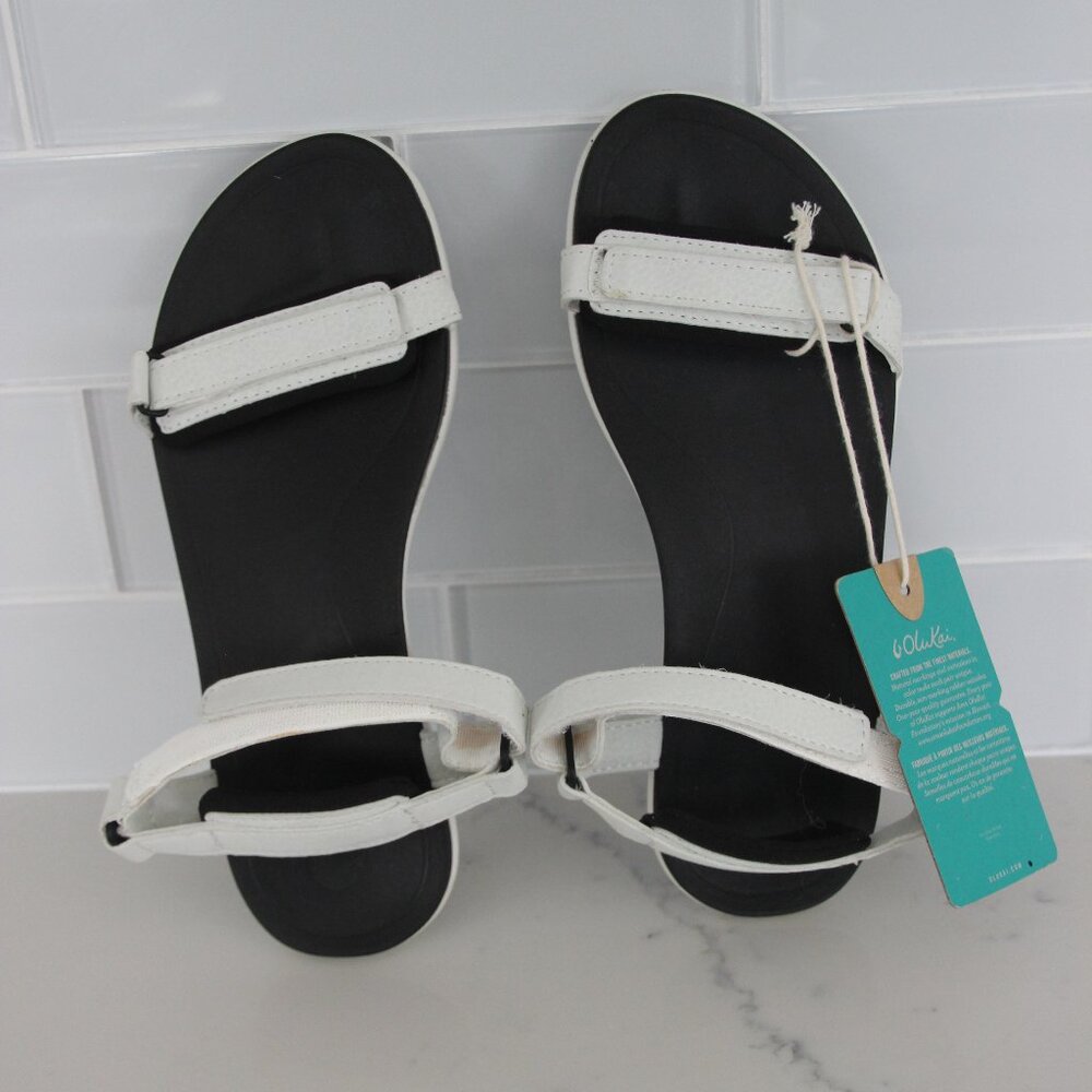 NWT Olukai Luana Women's Black/White Sandal.  Size 7